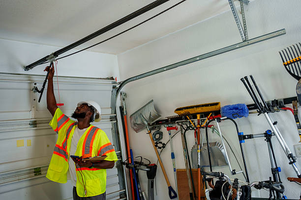 Professional Garage Door Panel Replacement technician working in Dunlap, IN